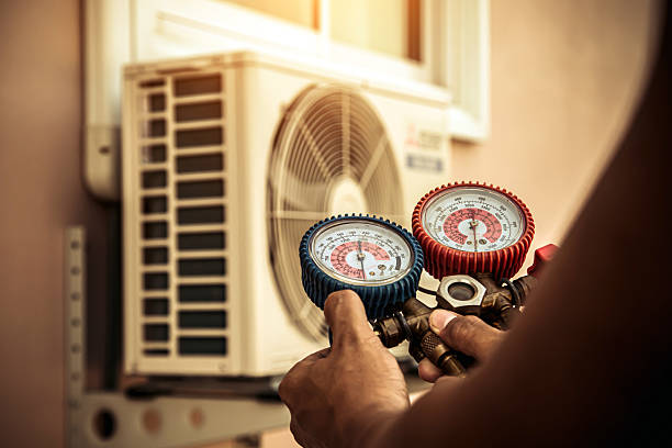 Professional Heat Pump Repair technician working in Manson, WA